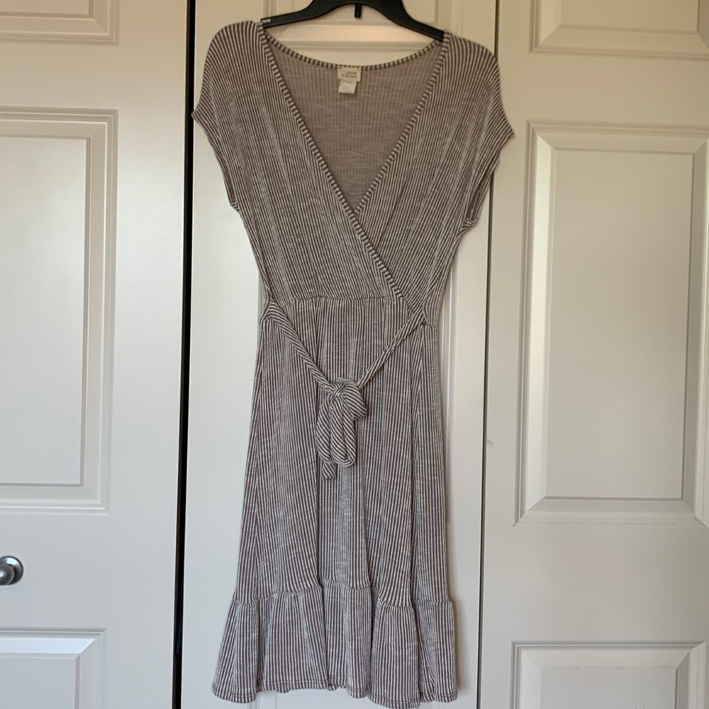This a taupe and white striped dress. Very comfortable and stretchy